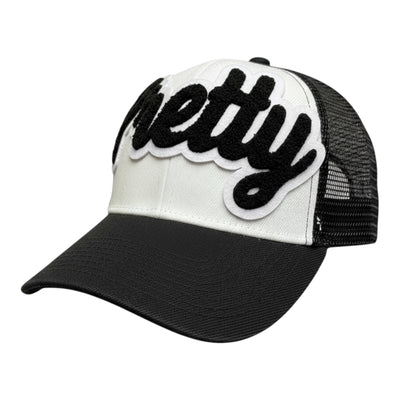 Black and white cap with 'Pretty' text on a white background