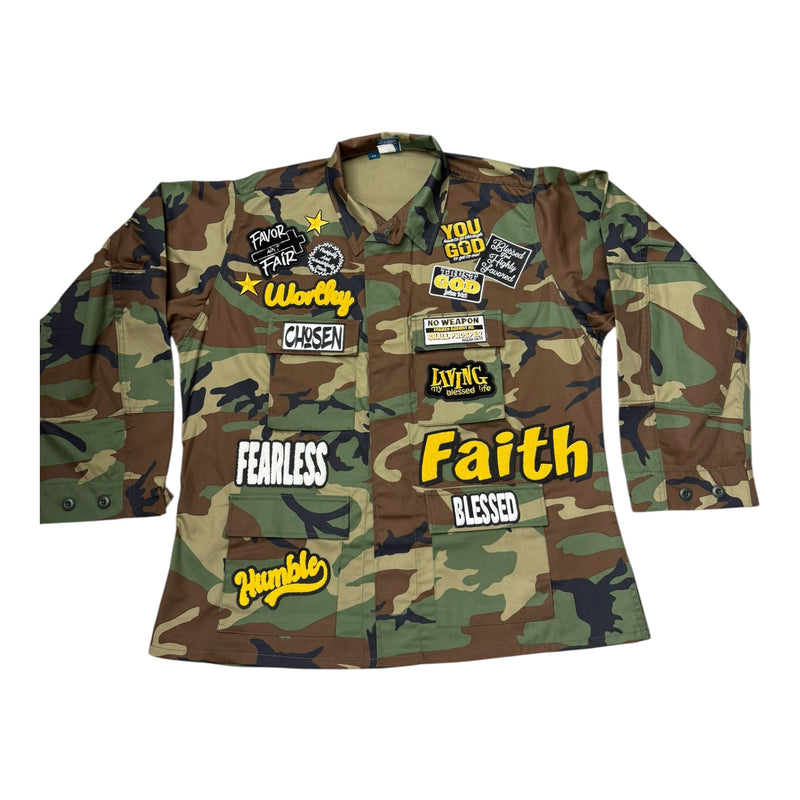 Camouflage coat with various patches and text on a white background