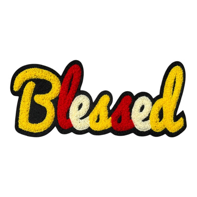 Embroidered patch with 'Blessed' text in yellow, red, and white on a white background