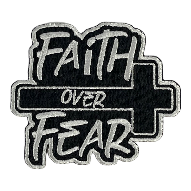 A premium embroidered iron on patch with the text &