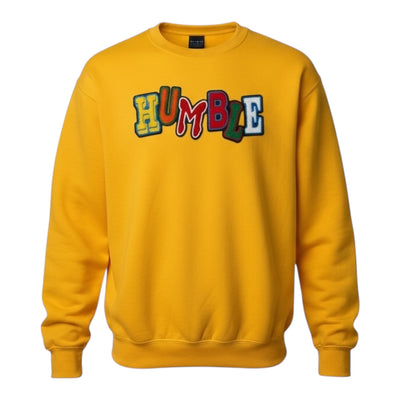 Yellow sweatshirt with colorful 'HUMBLE' text on a white background