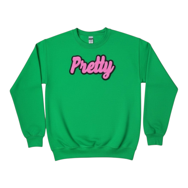 green sweatshirt with pink Pretty logo on white background 