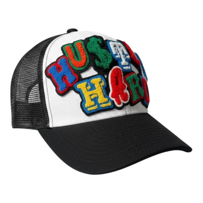 Colorful 'Hustle Hard' cap with black mesh back on a white background