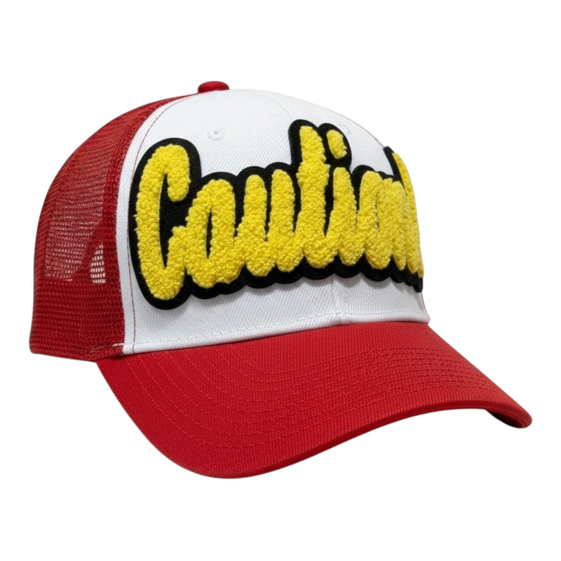 Red and white cap with yellow and black text on a white background