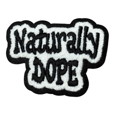 Embroidered patch with 'Naturally Dope' text on a white background