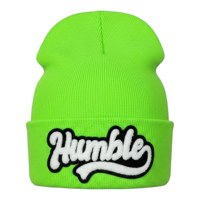 Green beanie with 'Humble' text on a white background