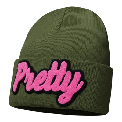 Green beanie with pink 'Pretty' patch on a white background