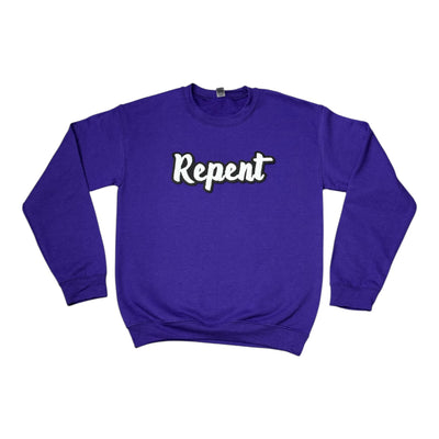 Purple sweatshirt with 'Repent' text on a white background